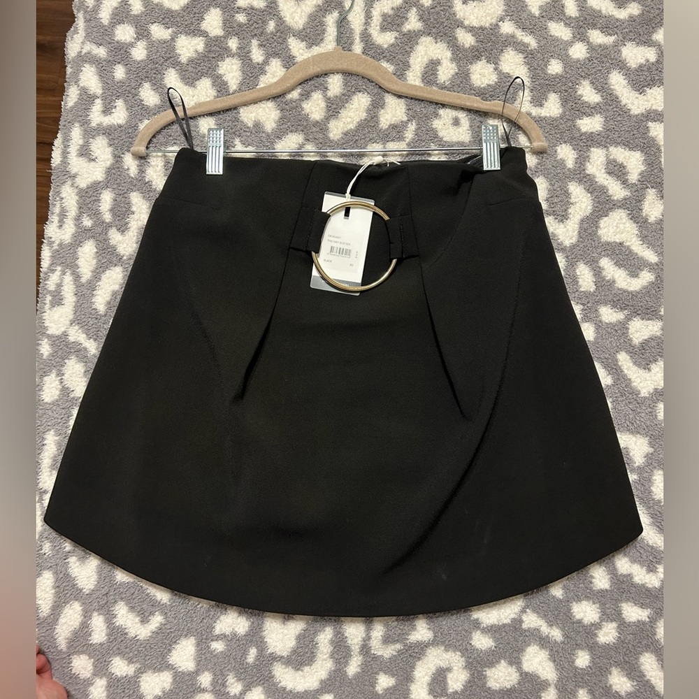 Black skirt with gold ring